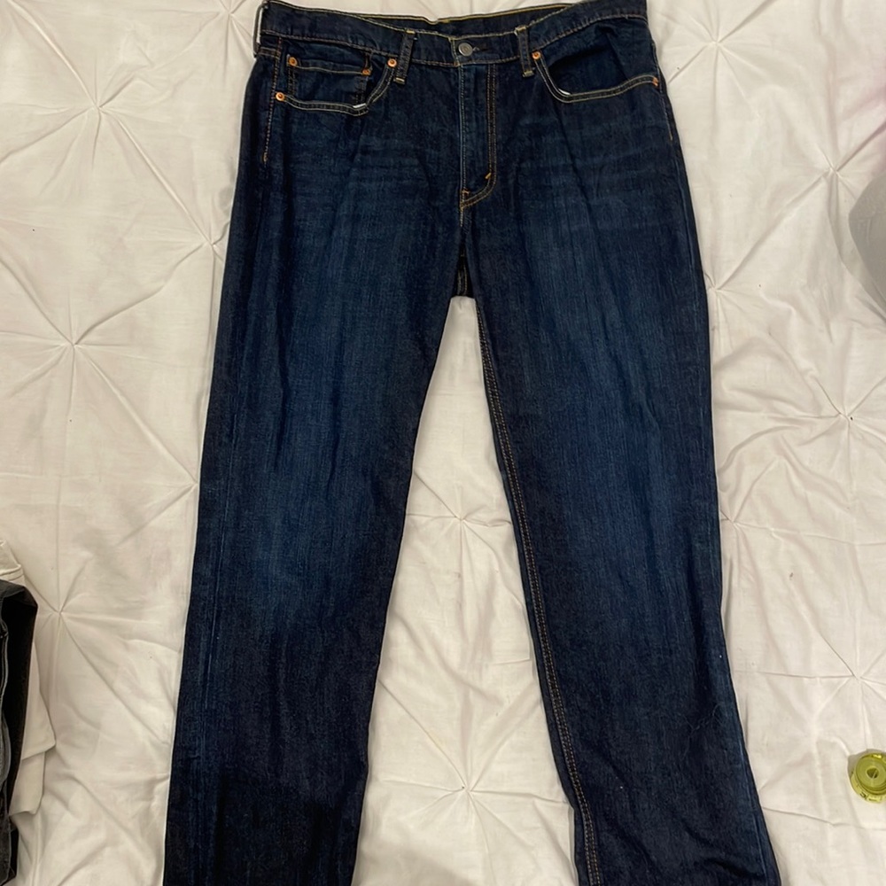 Levi’s dark-washed and straight-leg jeans